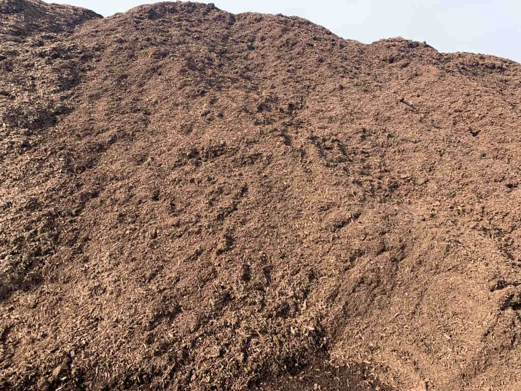 Large pile of brown mulch